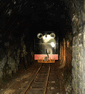 A tight fit in Garnedd tunnel on the FR. (Photo: A.Thomas/FR)