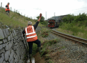 138 approaches the North Wales Track Gang as they clear ditches North of Pitts Head. (Photo: D.Firth)