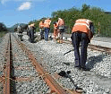 Using Kango Hammers to pack the track to the correct height (Photo: David Firth)