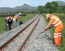 Building up the ballast shoulders just North of Ynysfor. (Photo D.Firth)