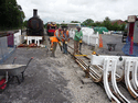 Hand tamping the new half panel. (Photo: S.Broomfield)