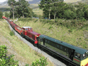 The Vale of Ffestiniog and Caernarfon Castle heading for Beddgelert at Pont Cae'r Gors. (Photo: Peter Balderston)