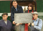 The slate plaque, supplied by Llechwedd Slate Quarries, is pictured with Ffestiniog and Welsh Highland General Manager Paul Lewin, Llechwedd engraver Eirian Jones, Driver Vince Bashford and fireman Kevin Lee. Photo by Andrew Thomas