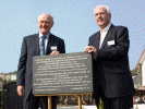 Dr John Prideaux, Chairman of the Ffestiniog & Welsh Highland Railways and Pete Waterman pose with the plaque marking the opening of the Welsh Highland Railway. Pic: Andrew Thomas