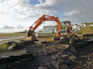 Exploratory work ahead of the Cob Widening project starting in January 2012 involved building an access ramp to the foreshore at Porthmadog Harbour Station. Pic: Andrew Thomas