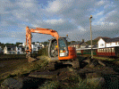 Exploratory work ahead of the Cob Widening project starting in January 2012 involved building an access ramp to the foreshore at Porthmadog Harbour Station. Pic: Andrew Thomas