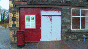 Painting the Goods Shed Door at Dinas - photo by Andy Keene