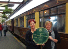 Pont Croesor Station Mistress Belinda Gammon and F&WHR Volunteer Coordinator Tricia Doyle with the HRA Award - Andrew Thomas