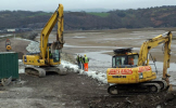 The last piece of armour stone is placed - Andrew Thomas