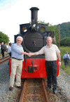 Festiniog Railway Company Director Mike Hart shakes hands with WHHR Chairman Martyn Owen at Hafod y Llyn. (Photo: Chris Parry).