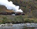 138 double heading with No 143 on a special train - seen in the Aberglaslyn Pass.