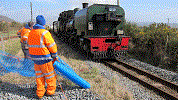 Erecting blue barrier fence at Pen y Mount - David Firth