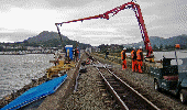 Pouring concrete signal bases on the cob - Andrew Thomas