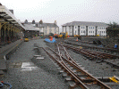 Preparing the ground for tracklaying in the yard - David Tidy