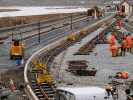 Rails now approaching the station building in the FR platform road, the gap in the platform edging finally filled in and tracklaying for the yard progressing - Andrew Thomas