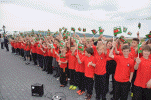 Local schoolchildren welcome the Minister - Pic: Chris Parry