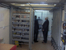 Steve Robinson and Ian Walsh wait to show the Minister the inside of the relay-room - Pic: Peter Matthews